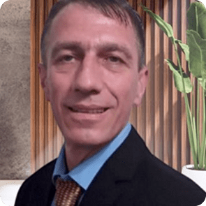 Professional portrait of AIDA Home Realty real estate agent Senahid Halilovic