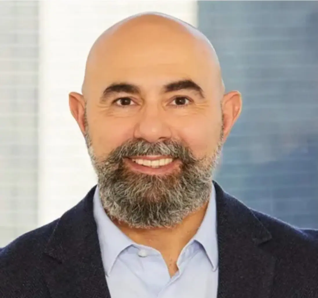 Professional portrait of AIDA Home Realty real estate agent Adel Assavi
